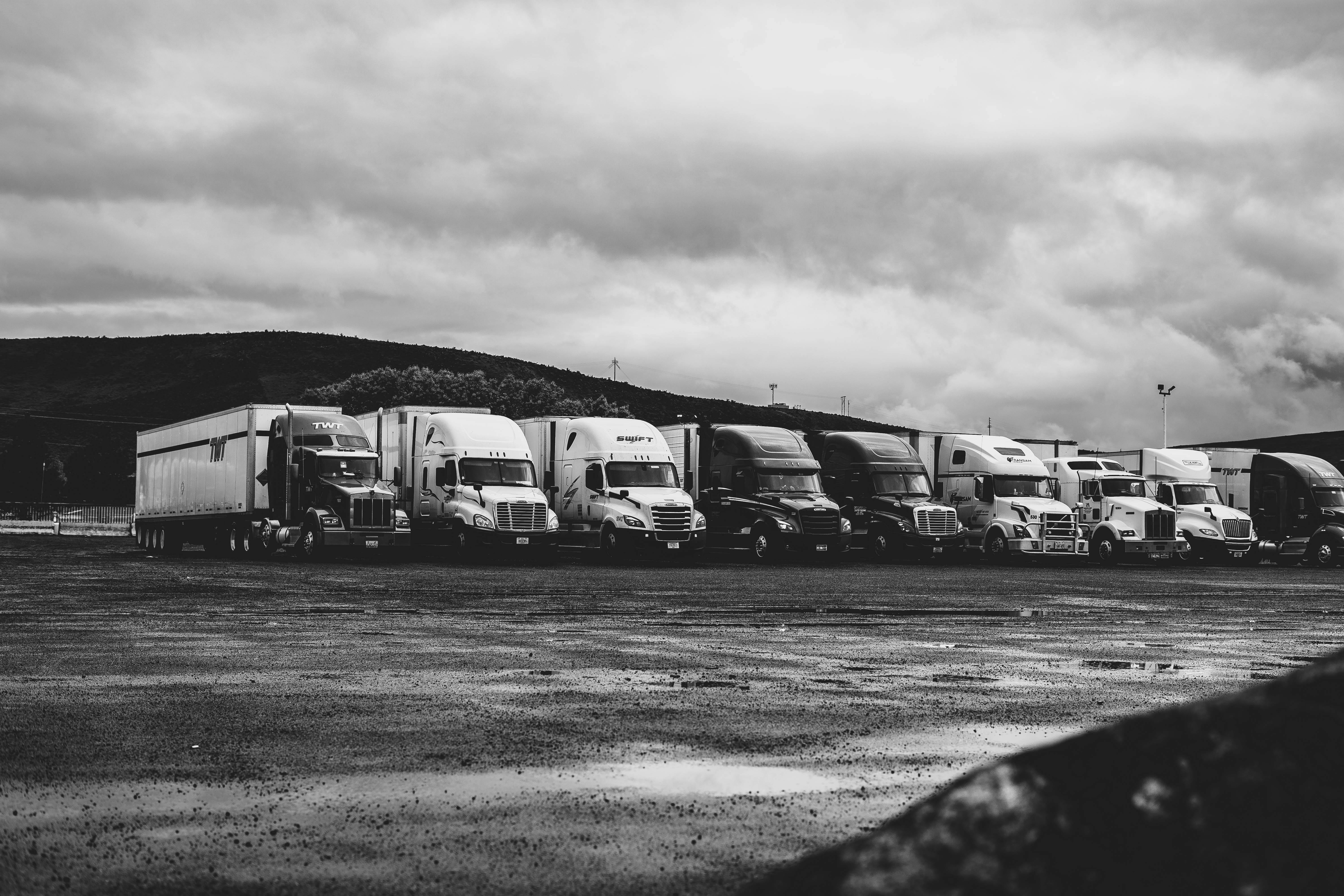 Fleet of trucks at a logistics yard